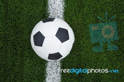 Soccer Ball Or Football On Soccer Field Stock Photo