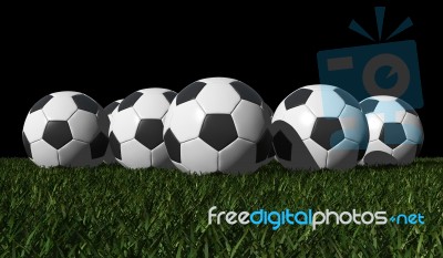 Soccer Balls On Grass Stock Image