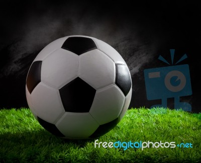 Soccer Football On Green Grass Stock Photo