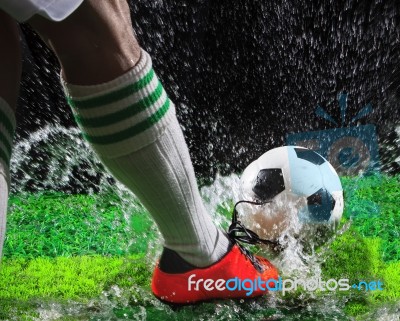 Soccer Football Players Kicking To Soccer Ball On Green Grass Fi… Stock Photo