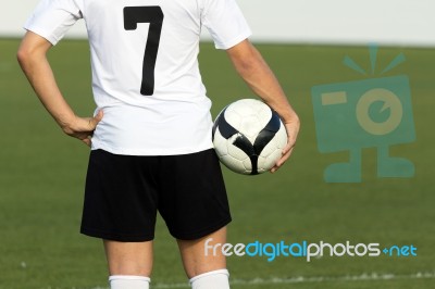 Soccer Player With Ball, Outdoors Stock Photo