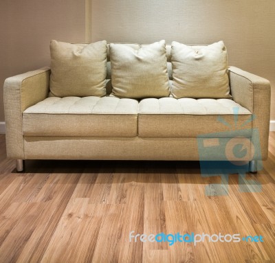 Sofa And Wooden Floor Stock Photo