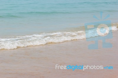 Soft Wave Of The Blue Ocean On The Seashore Of Thailand Stock Photo