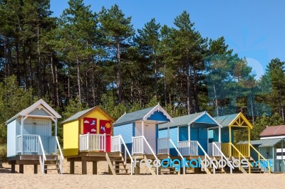 Some Brightly Coloured Beach Huts In Wells Next The Sea Stock Photo