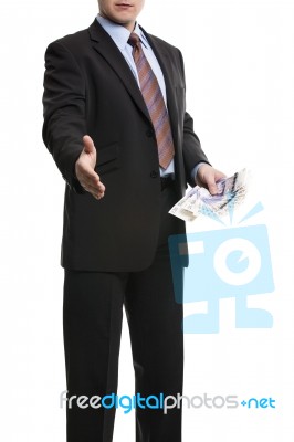 Some Unrecognizable Businessman In Dark Suit Shows A Spread Of 2… Stock Photo