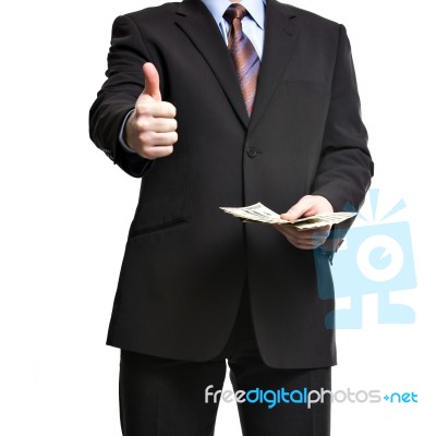 Some Unrecognizable Businessman In Suit Showing  A Spread Of Cas… Stock Photo