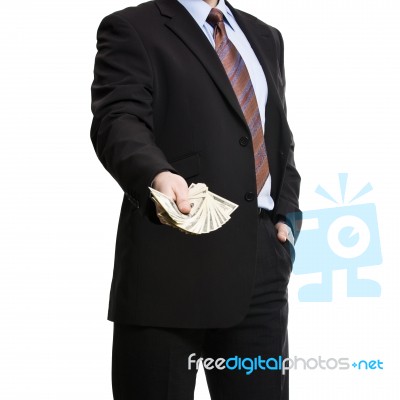 Some Unrecognizable Businessman In Suit Showing  A Spread Of Cas… Stock Photo