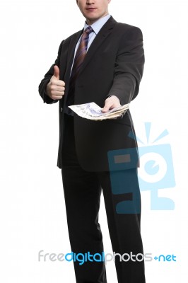 Some Unrecognizable Businessman In Suit Showing A Spread Of Poun… Stock Photo