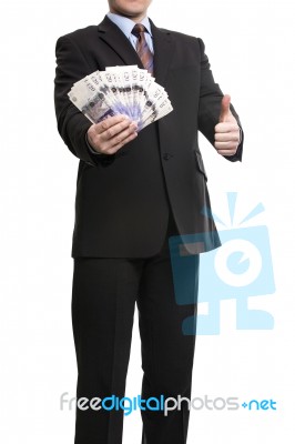 Some Unrecognizable Businessman In Suit Showing A Spread Of Poun… Stock Photo