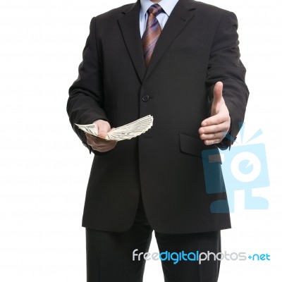 Some Unrecognizable Businessman In Suit Shows A Spread Of Cash A… Stock Photo