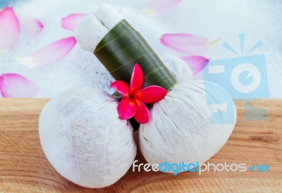 Spa And Wellness Treatment Setup On Wooden Panel Stock Photo