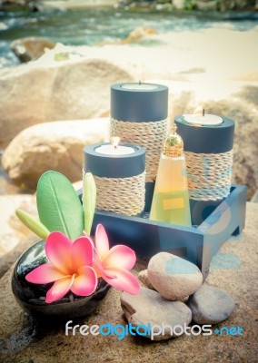 Spa Setting And Candle With Plumeria Or Frangipani Flower On Sto… Stock Photo