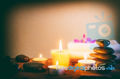 Spa Still Life With Aromatic Candles,orchid Flower And Towel Stock Photo