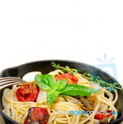 Spaghetti Pasta With Baked Cherry Tomatoes And Basil Stock Photo