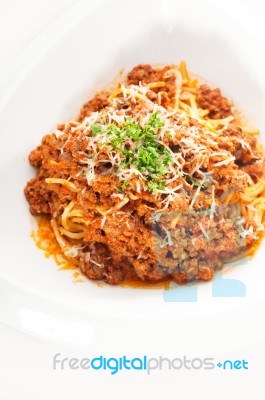 Spaghetti With Bolognese Sauce And Fresh Vegetables On Backgroun… Stock Photo