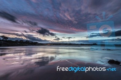 Spectacular Sunset On The Beach Of Arnao, Asturias, Spain, Stock Photo