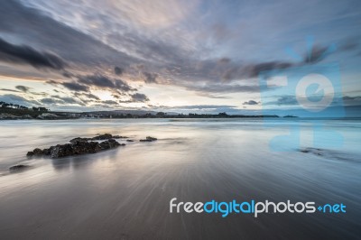 Spectacular Sunset On The Beach Of Arnao, Asturias, Spain, Stock Photo