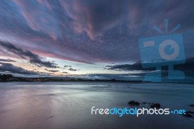 Spectacular Sunset On The Beach Of Arnao, Asturias, Spain, Stock Photo