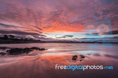 Spectacular Sunset On The Beach Of Arnao, Asturias, Spain, Stock Photo