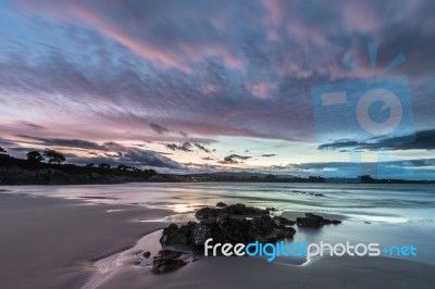 Spectacular Sunset On The Beach Of Arnao, Asturias, Spain, Stock Photo