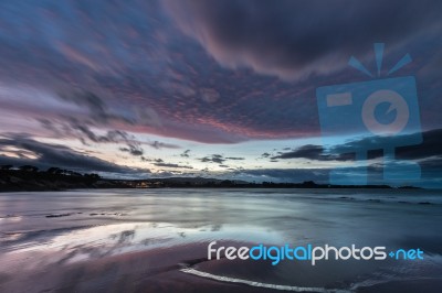 Spectacular Sunset On The Beach Of Arnao, Asturias, Spain, Stock Photo