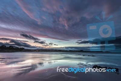 Spectacular Sunset On The Beach Of Arnao, Asturias, Spain, Stock Photo