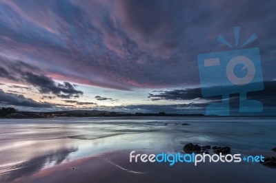 Spectacular Sunset On The Beach Of Arnao, Asturias, Spain, Stock Photo