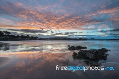 Spectacular Sunset On The Beach Of Arnao, Asturias, Spain, Stock Photo