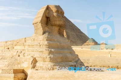 Sphinx And Pyramid Of Giza Stock Photo