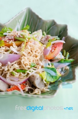 Spicy Salad With Pork, Tomatoes And Noodle Stock Photo