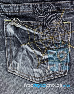 Spider Pattern On Jean Pocket Stock Photo