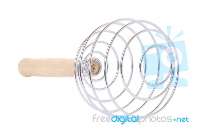 Spiral Of Metallic Spring Whisk On White Background Stock Photo