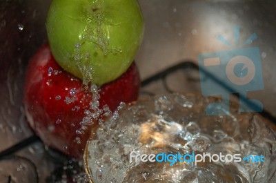 Splashing Apples Stock Photo