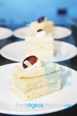 Sponge Cakes On Plates Stock Photo