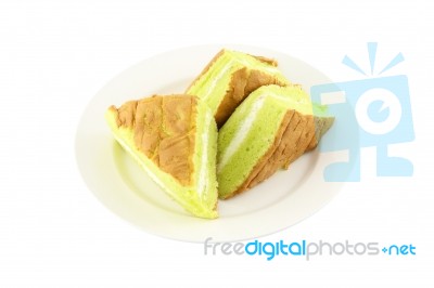 Sponge Cream Cake Dish On White Background Stock Photo