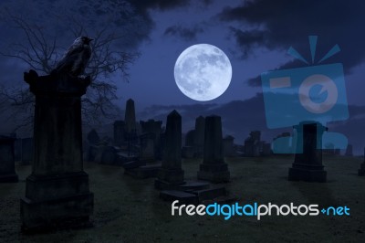 Spooky Night At Cemetery With Old Gravestones, Full Moon And Bla… Stock Photo