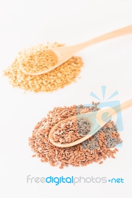 Spoon Of Flax Seed On Clean Kitchen Table Stock Photo