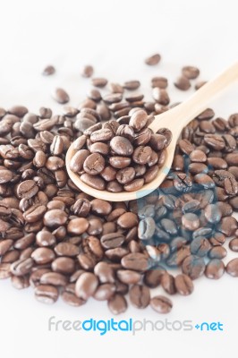 Spoon Of Roasted Coffee Bean Stock Photo