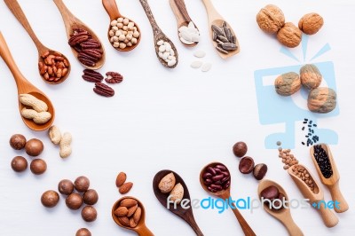 Spoon Of Various Legumes And Different Kinds Of Nuts Walnuts Ker… Stock Photo