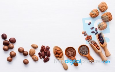 Spoon Of Various Legumes And Different Kinds Of Nuts Walnuts Ker… Stock Photo