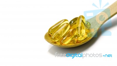 Spoonful Of Fish Oil Capsule Stock Photo