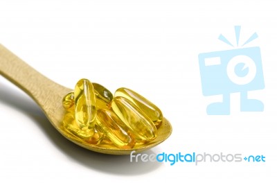 Spoonful Of Vitamin Capsule Stock Photo