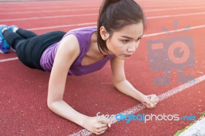 Sport Urban Young Athletic Woman Doing Push-ups. Muscular And St… Stock Photo