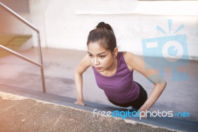 Sport Urban Young Athletic Woman Doing Push-ups. Muscular And St… Stock Photo