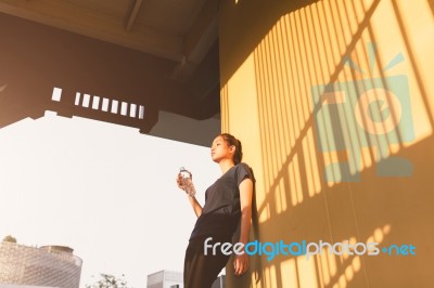 Sports Women Relax Time And Drinking Water Stock Photo