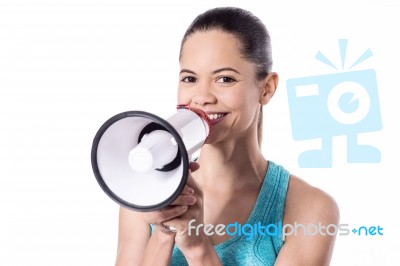 Sporty Lady With A Loudhailer Stock Photo