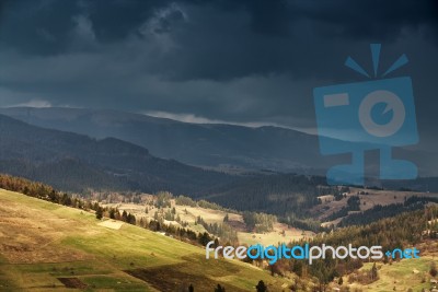 Spring Rain In Mountains. Thunder And Clouds Stock Photo