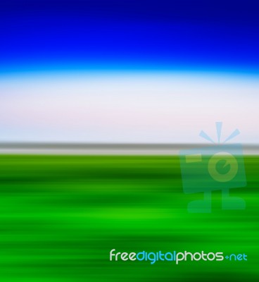 Square Vivid Green Landscape With Blue Sky  Motion Blur Abstract… Stock Photo