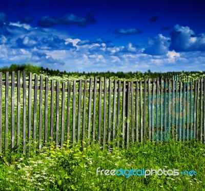 Square Vivid Summer Village Fence Horizon Cloudscape Background Stock Photo