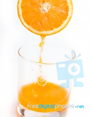 Squeezed Fresh Orange Shows Citrus Fruit And Beverages Stock Photo